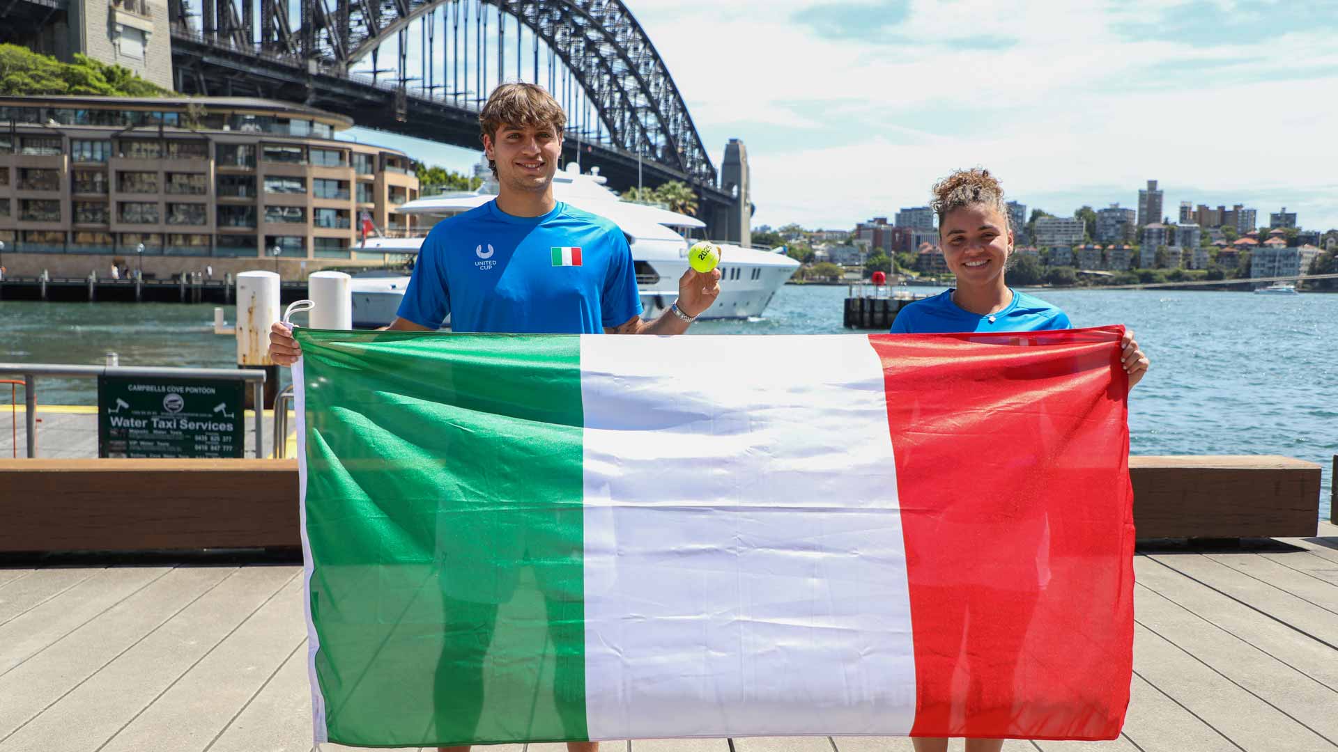 Flavio Cobolli and Jasmine Paolini pose in front of Sydney Harbour Bridge ahead of the 2025 United Cup.